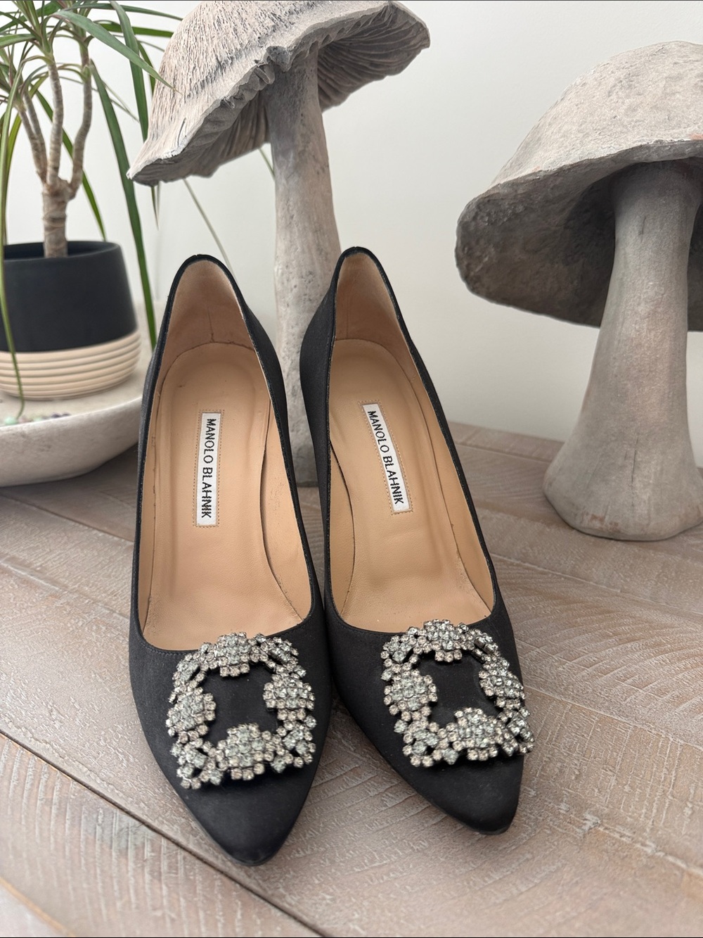 Manolo Blahnik Black Satin Pointed-Toe Pumps with Crystal Floral Buckles